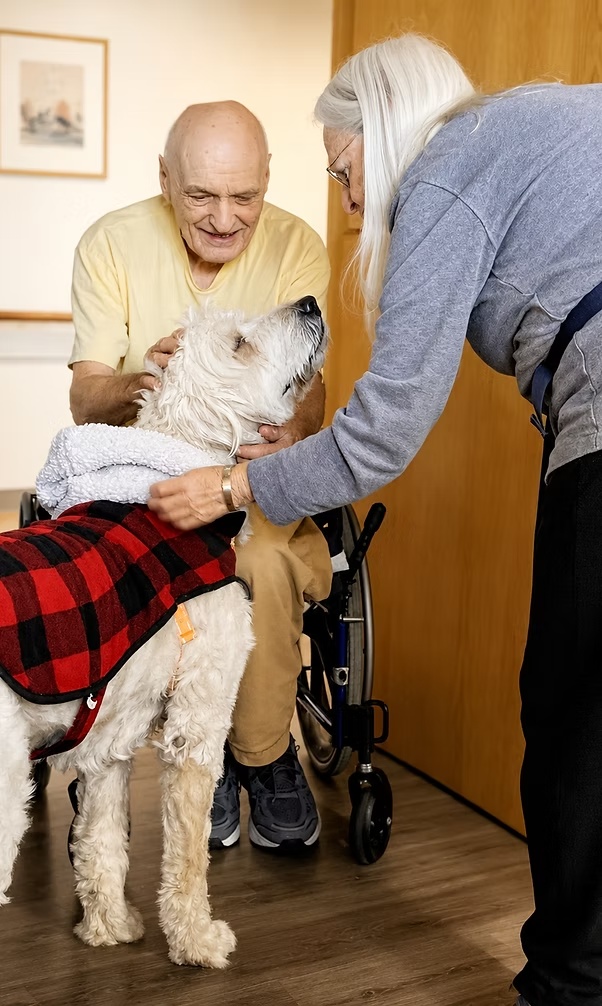 Ethan Place residents enjoying pet therapy